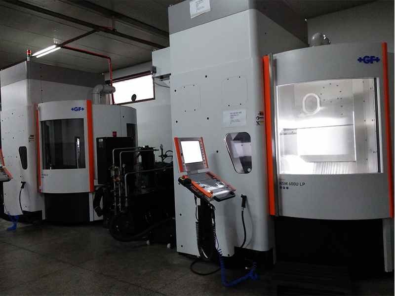 Swiss five axis machining center